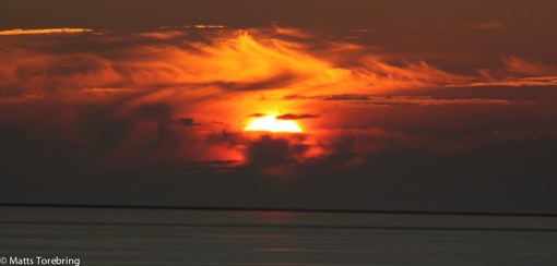 Solnedgång i Normandie